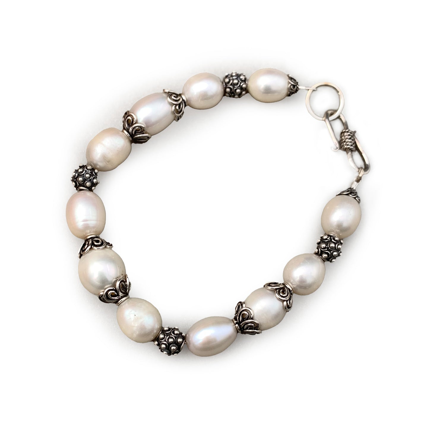 Hand Made white freshwater pearl and sterling silver Bali bead bracelet