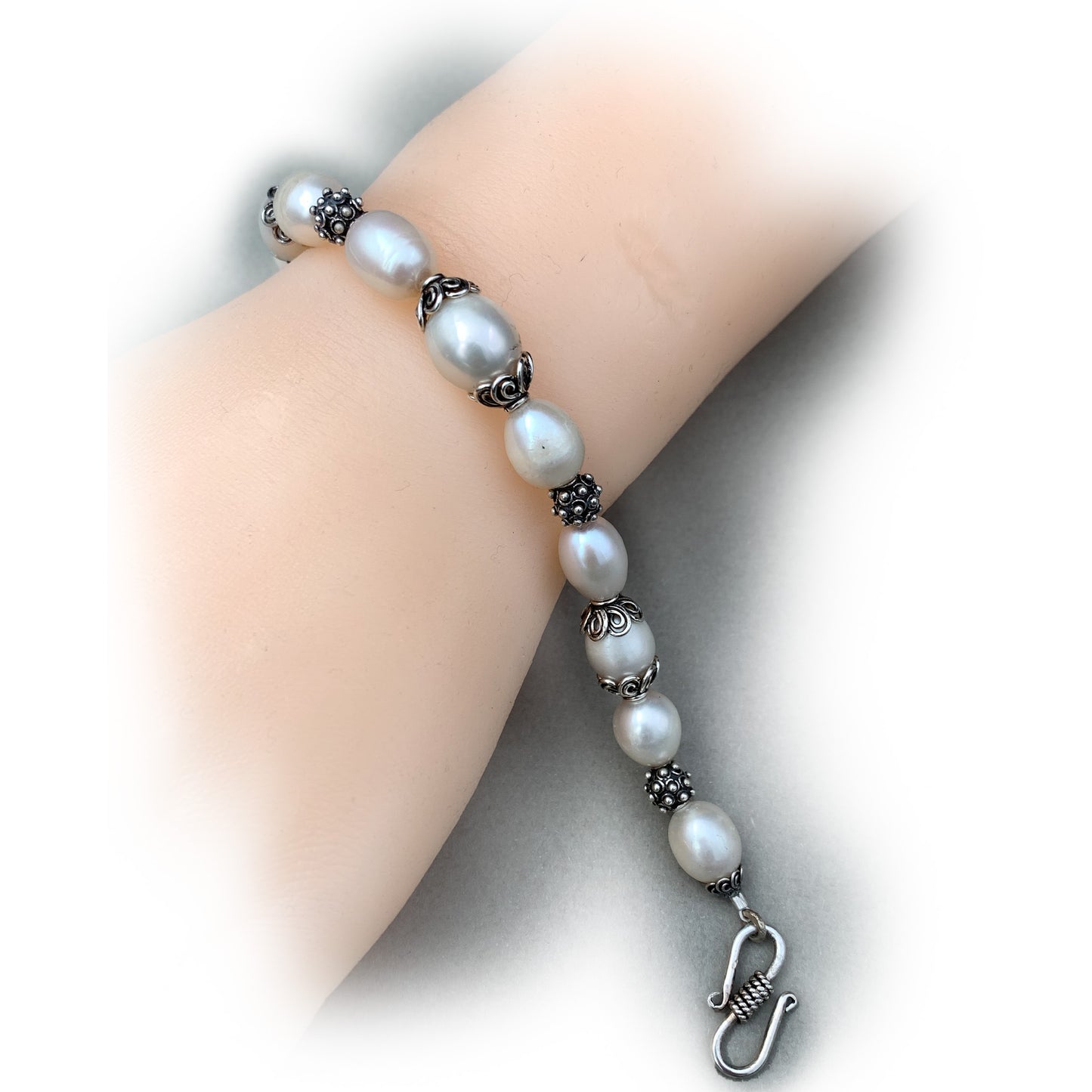 Hand Made white freshwater pearl and sterling silver Bali bead bracelet